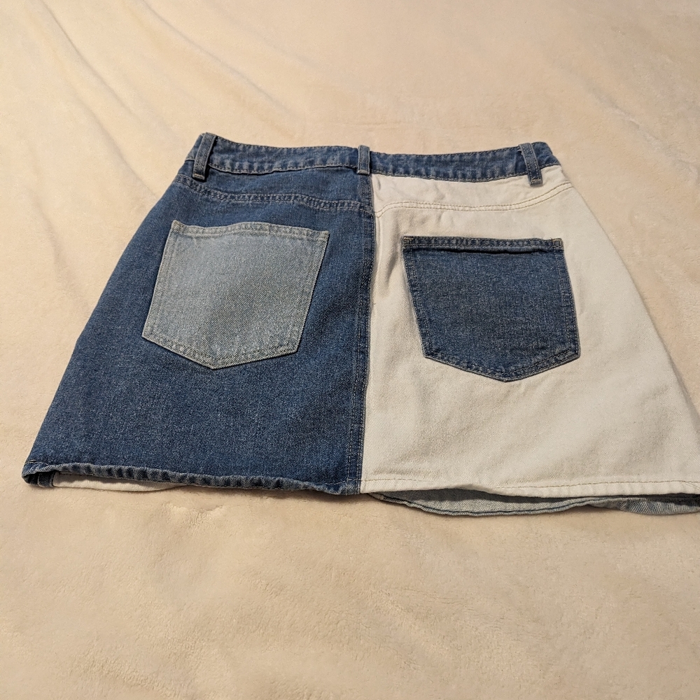 - Refuge Denim Mini Skirt. Different colours of denim. size a medium . - Picture 3 of 4